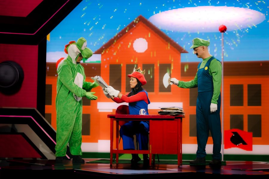 Wissenschaftskommunikation kann auch lustig sein. Das MaiThink X-Team auf der Bühne in Super Mario-Kostümen.